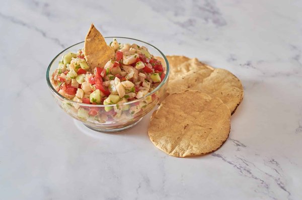 Quelles astuces pour un parfait ceviche péruvien équilibré en acidité et saveur ?